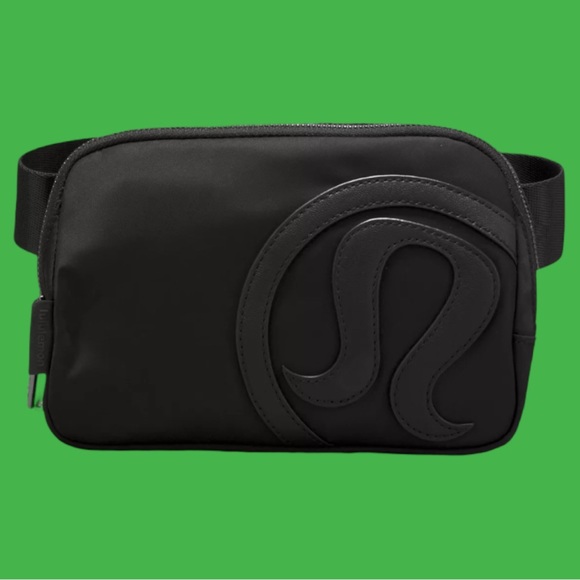 lululemon athletica Handbags - SOLD.  Lululemon MONOGRAMMED LOGO everywhere Belt bag Black/Black NWT